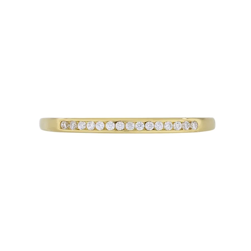 Anillo en oro amarillo de 18 Kilates, con zircones