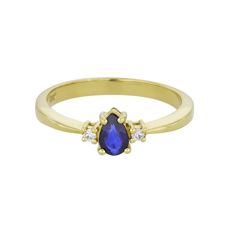 Anillo en oro amarillo de 18 Kilates, con zafiro central de 0.50 Ct y decoración en diamantes de 0.04 Ct