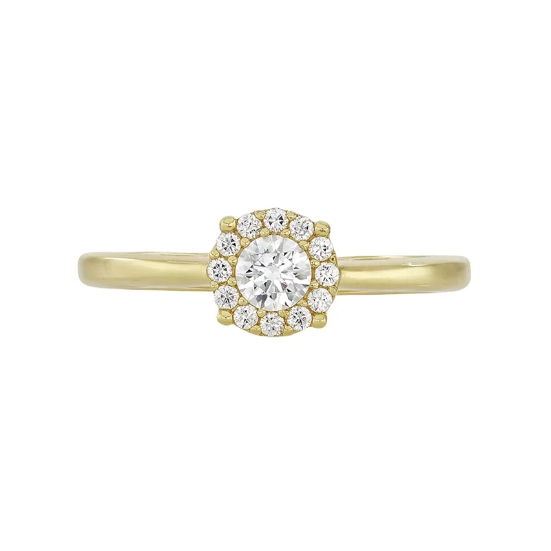 Anillo en oro amarillo de 18 Kilates, con zircón central y decoración en zircones