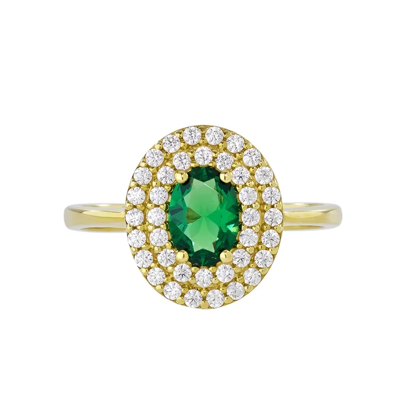 Anillo en oro amarillo de 18 Kilates, con zircón col central y decoración en zircones