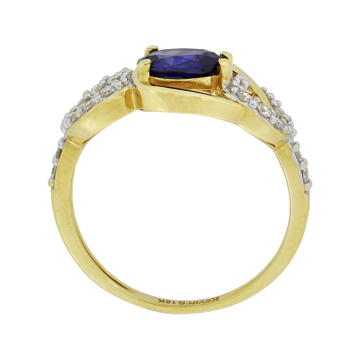 Anillo en oro amarillo de 18 Kilates, con zafiro central de 0.90 Ct y decoración en diamantes de 0.18 Ct