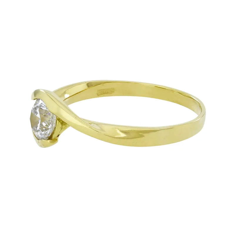 Anillo en oro amarillo de 18 Kilates, con zircón central