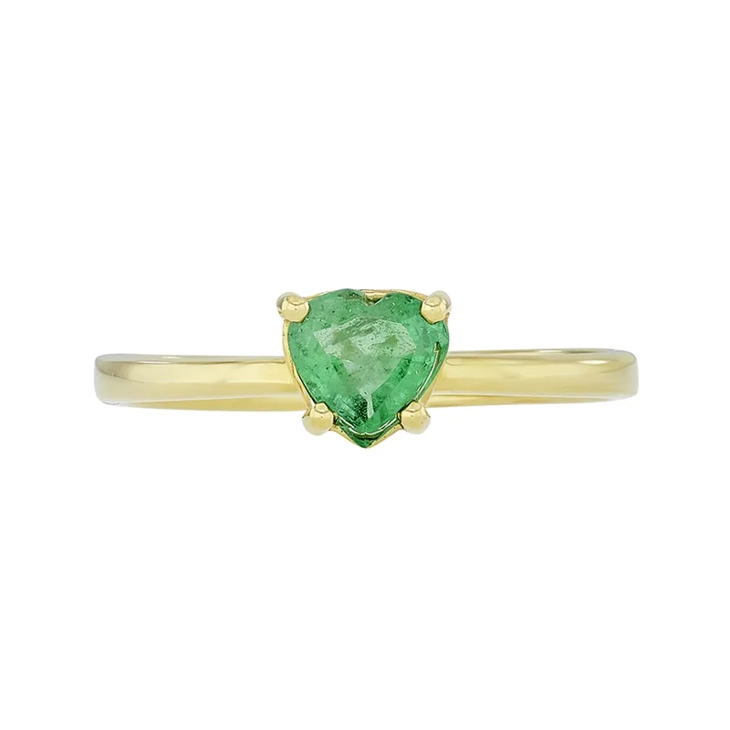 Anillo en oro amarillo de 18 Kilates, con esmeralda central de 0.60 Ct