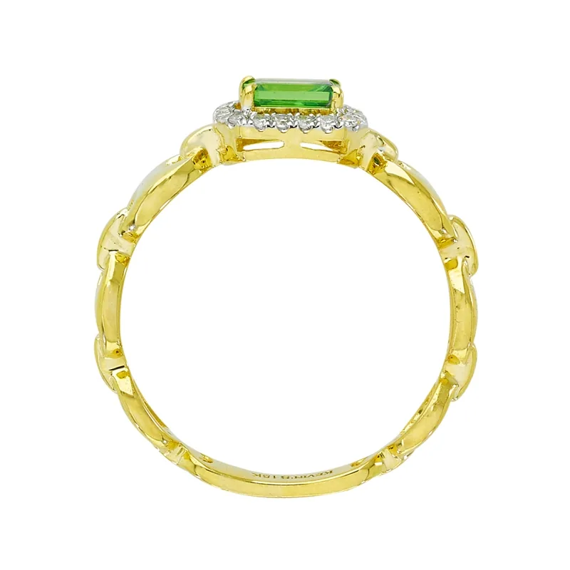 Anillo en oro amarillo de 18 Kilates, con granate central y decoración en diamantes de 0.09 Ct