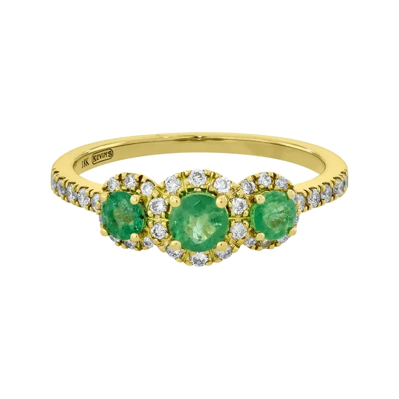 Anillo en oro amarillo de 18 Kilates, con esmeraldas de 0.40 Ct y diamantes de 0.20 Ct