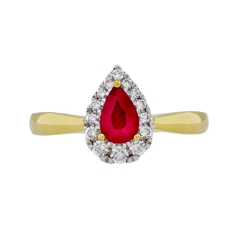 Anillo en oro amarillo de 18 Kilates, con rubí central de 0.42 Ct y decoración en diamantes de 0.15 Ct