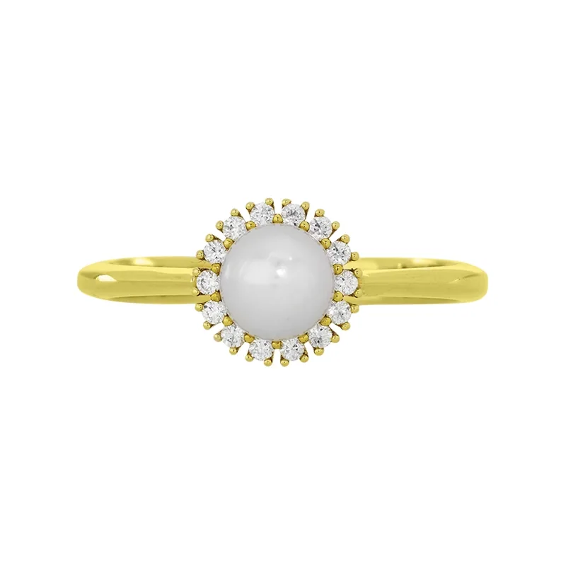 Anillo en oro amarillo de 18 Kilates, con perla central de 5 mm de ancho aprox y decoración en zircones