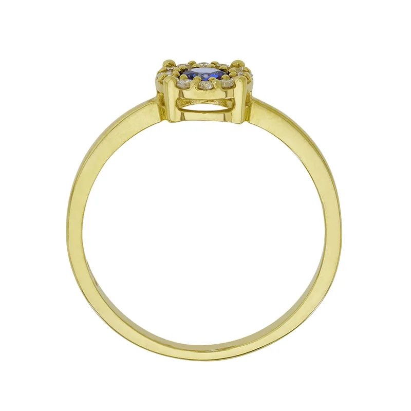 Anillo en oro amarillo de 18 Kilates, con zafiro central de 0.32 Ct y decoración en diamantes de 0.12 Ct