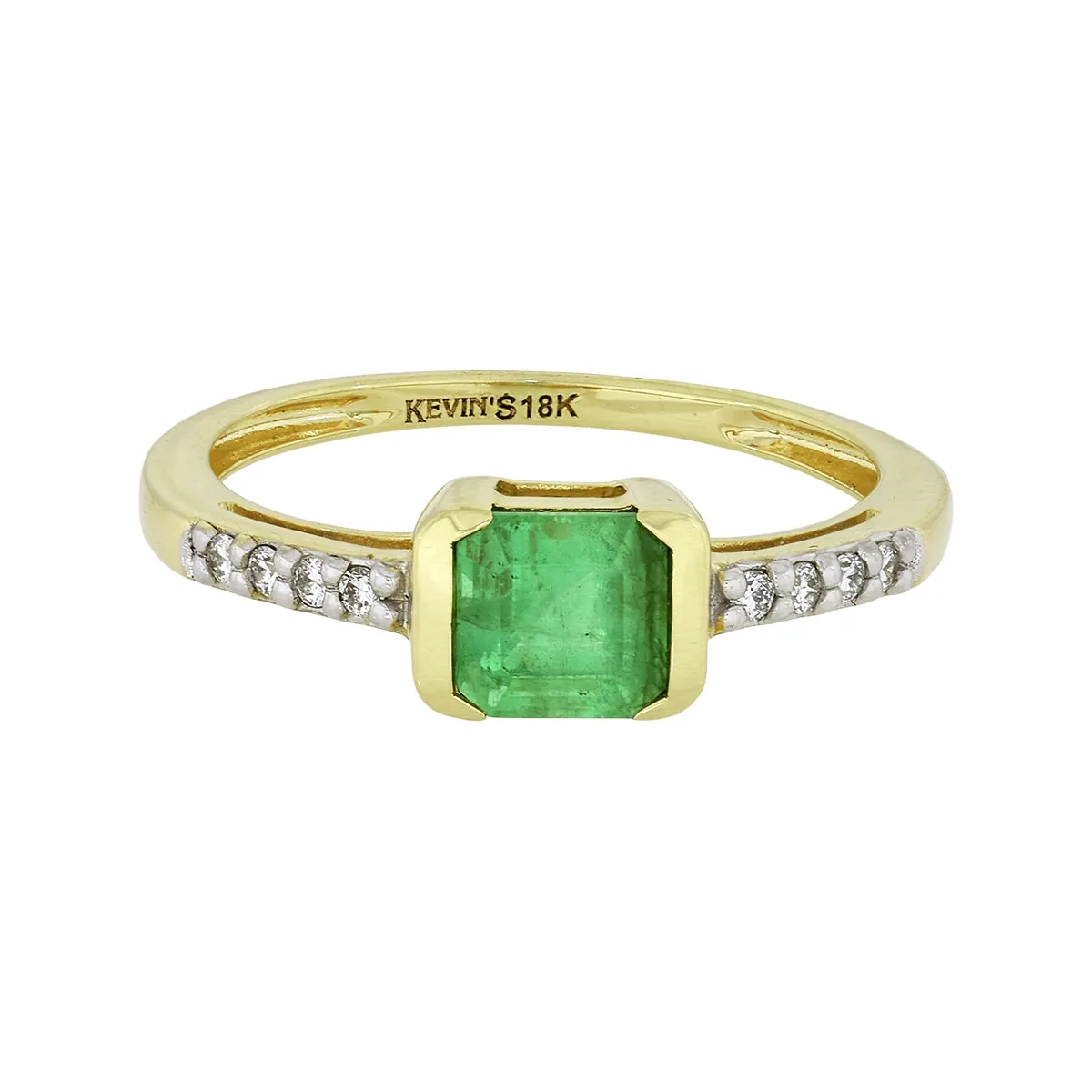 Anillo en oro amarillo de 18 Kilates, con esmeralda central de 0.65 Ct y decoración en diamantes de 0.07 Ct