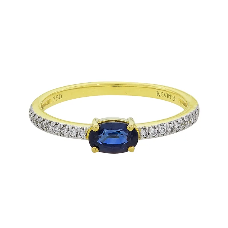Anillo en oro amarillo de 18 Kilates, con zafiro central de 0.52 Ct y decoración en diamantes de 0.10 Ct