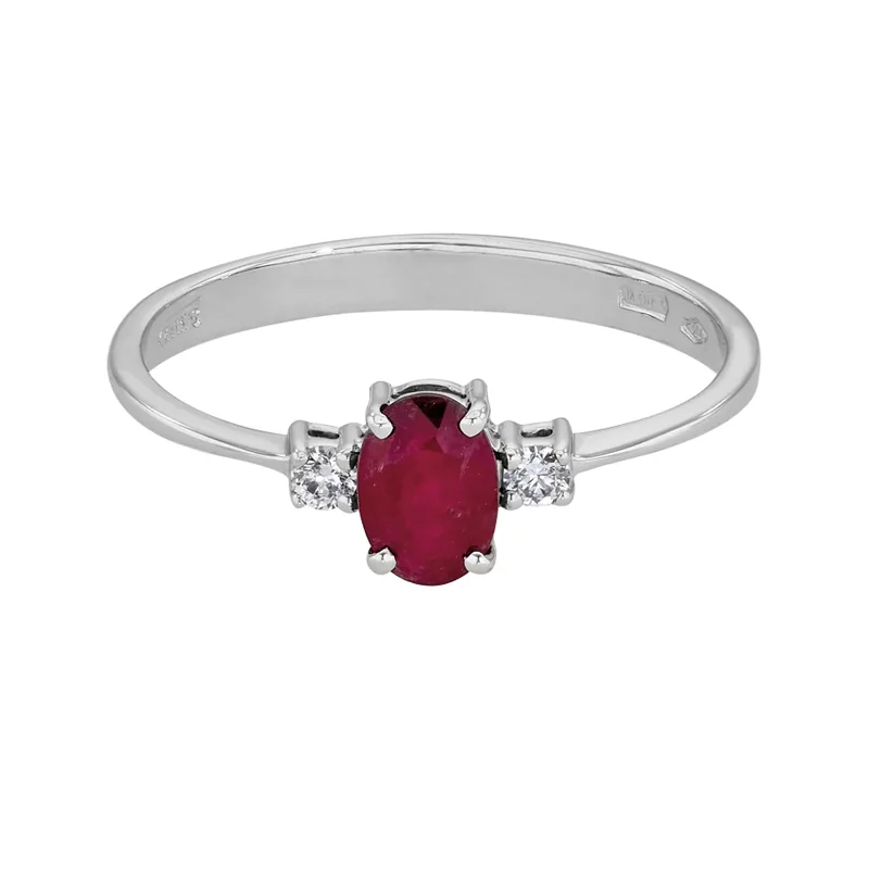 Anillo en oro blanco de 18 Kilates, con rubí central de 0.55 Ct y decoración en diamantes de 0.06 Ct