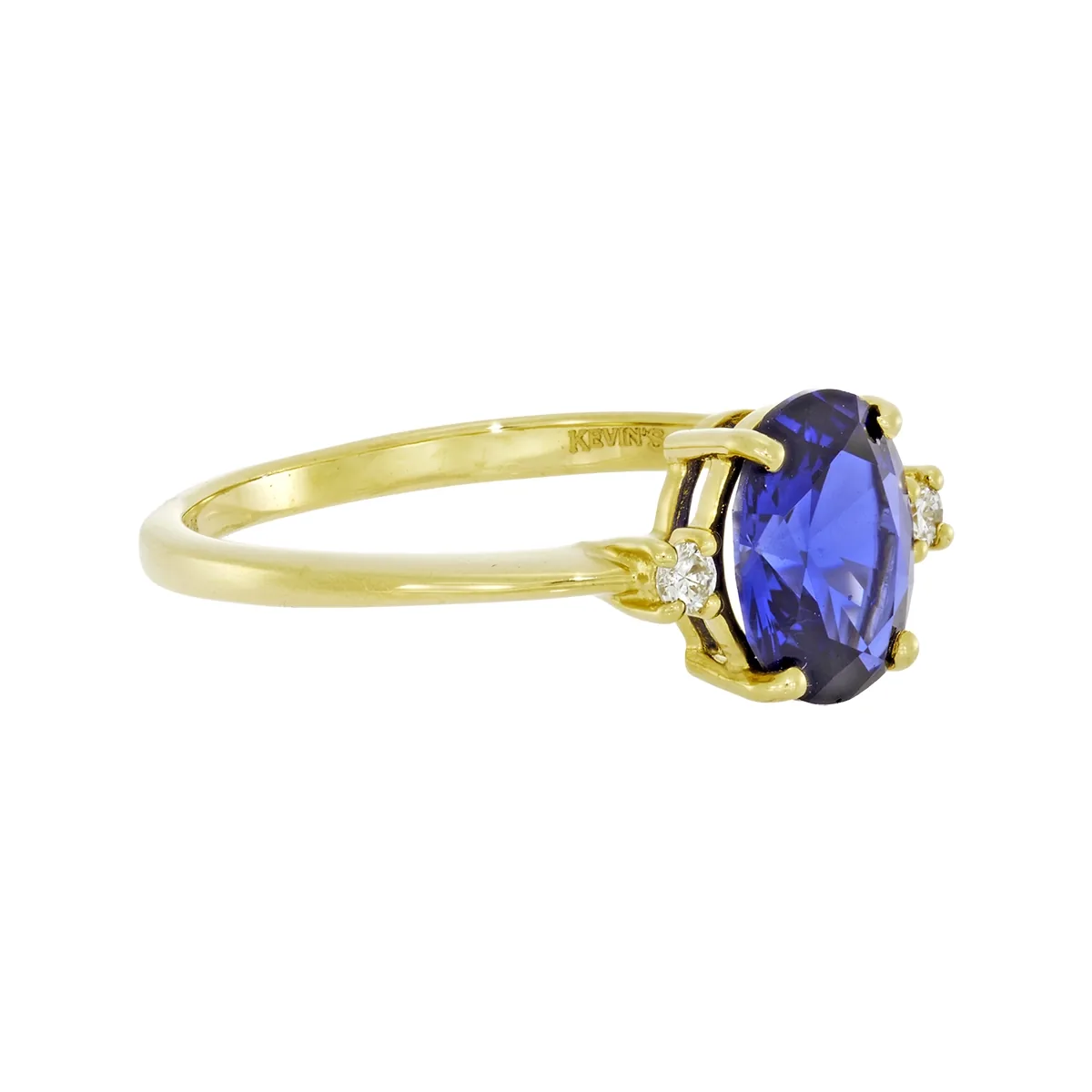Anillo en oro amarillo de 18 Kilates, con zafiro laboratorio central de 1.35 Ct y decoración en diamante de laboratorio de 0.04 Ct