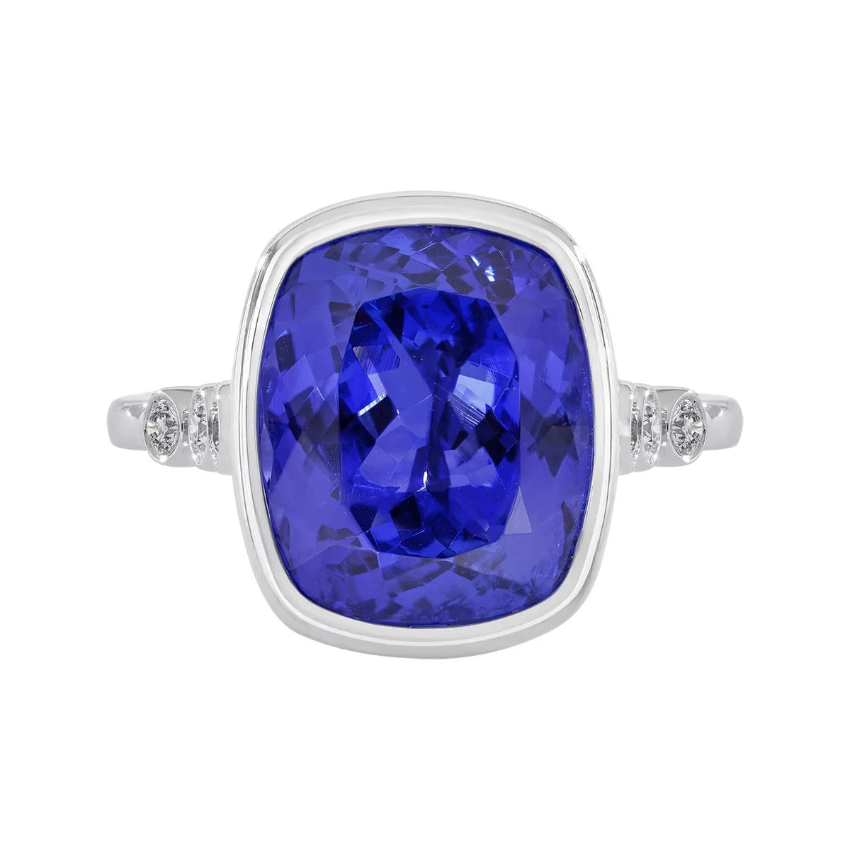 Anillo en oro blanco de 18 Kilates, con tanzanita central de 7.43 Ct y decoración en diamantes de 0.12 Ct