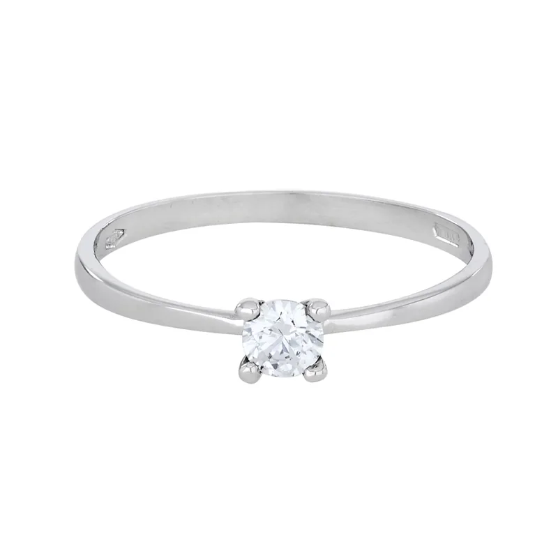 Anillo con zircon central redondo, oro tono blanco 18k, rodinado, liso