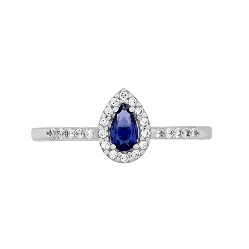 Anillo en oro blanco de 18 Kilates, con zircón col central y decoración en zircones