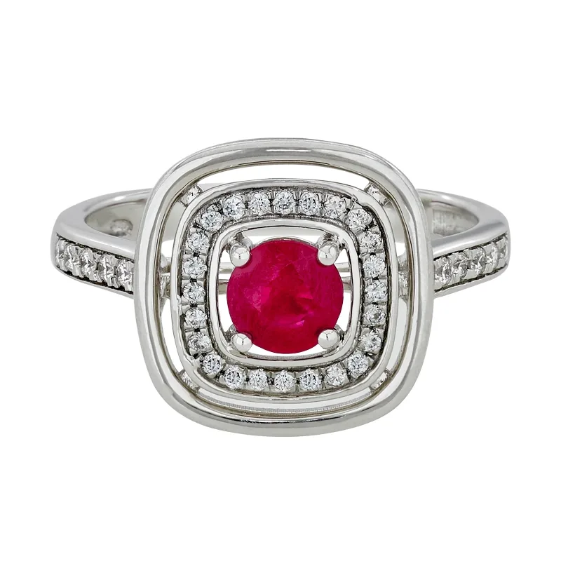 Anillo en oro blanco de 18 Kilates, con rubí central de 0.62 Ct y decoración en diamantes de 0.17 Ct