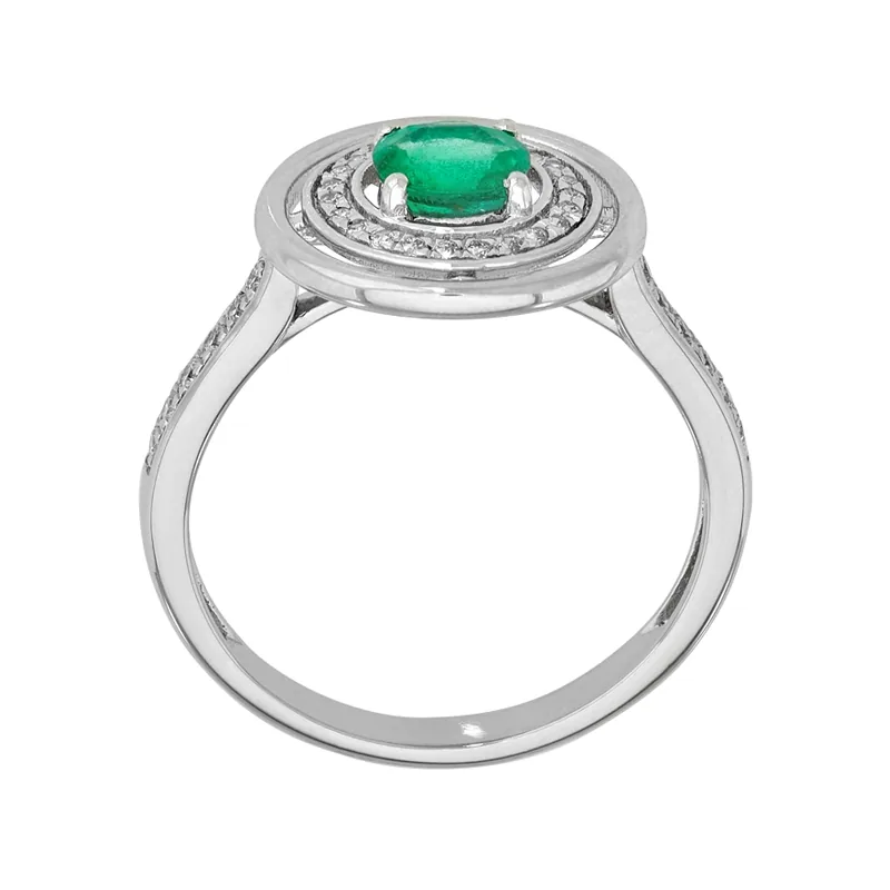 Anillo en oro blanco de 18 Kilates, con esmeralda central de 0.42 Ct y decoración en diamantes de 0.16 Ct