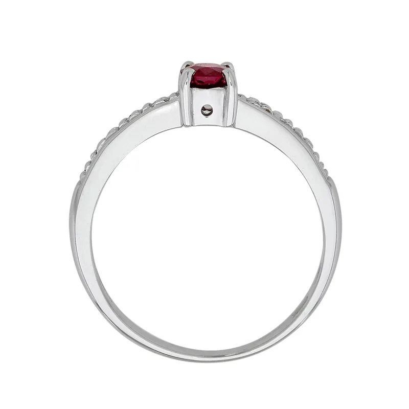 Anillo en oro blanco de 18 Kilates, con rubí central de 0.47 Ct y decoración en diamantes de 0.05 Ct