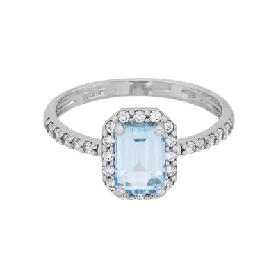 Anillo en oro blanco de 18 Kilates, con topacio central y decoración en zircones
