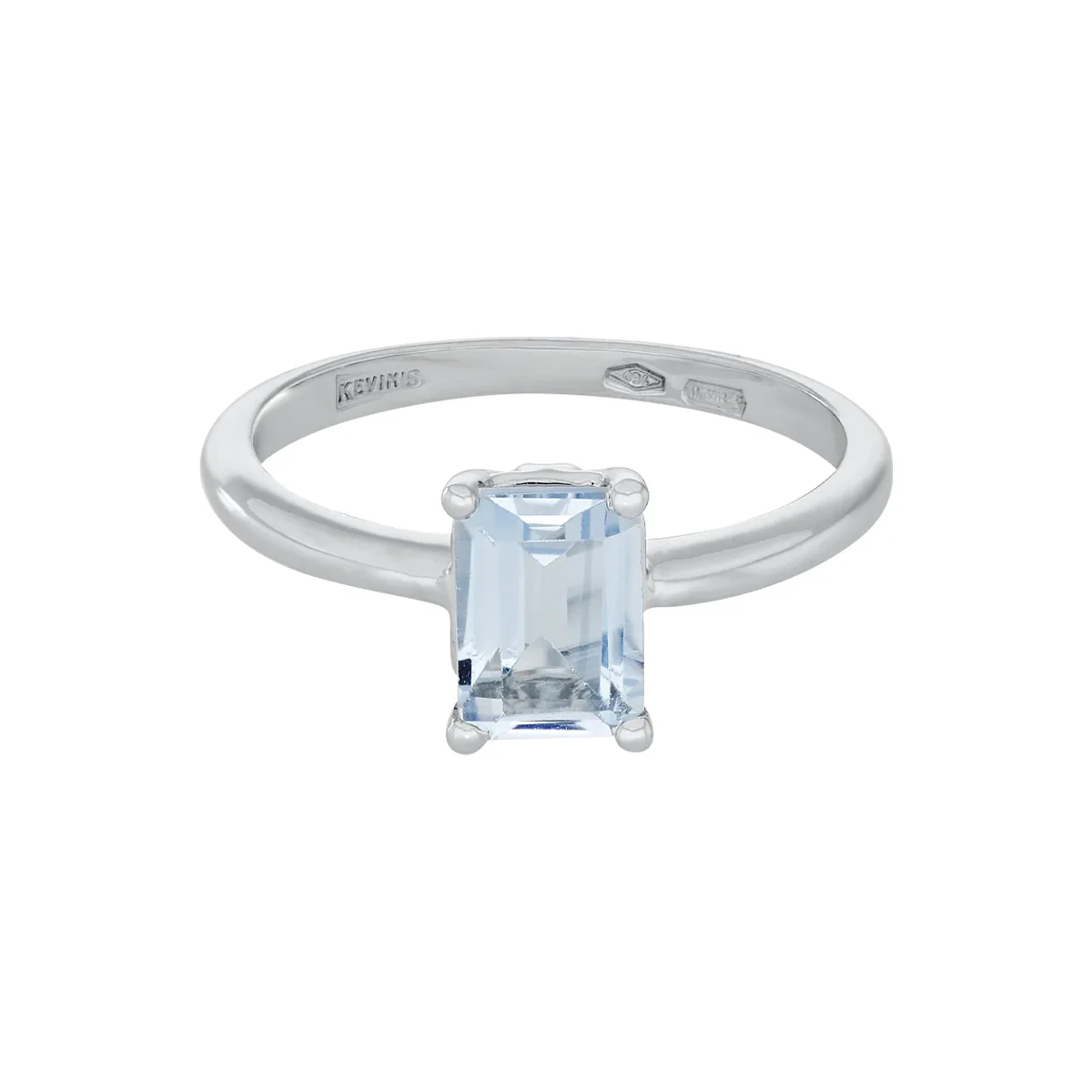 Anillo en oro blanco de 18 Kilates, con topacio central