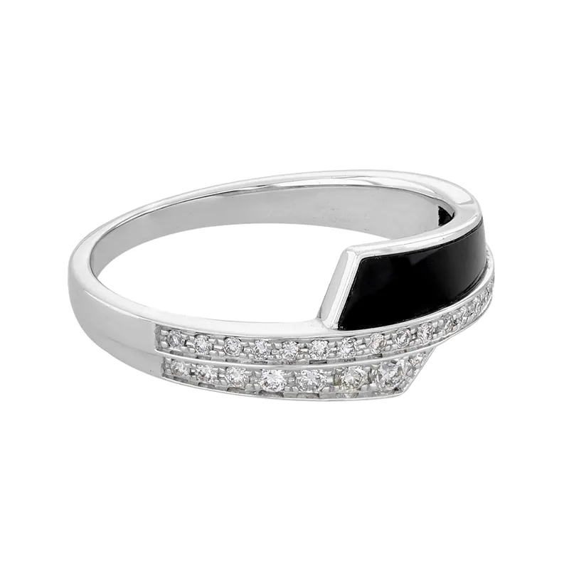 Anillo en oro blanco de 18 Kilates, con ónix central y decoración en diamantes de 0.16 Ct