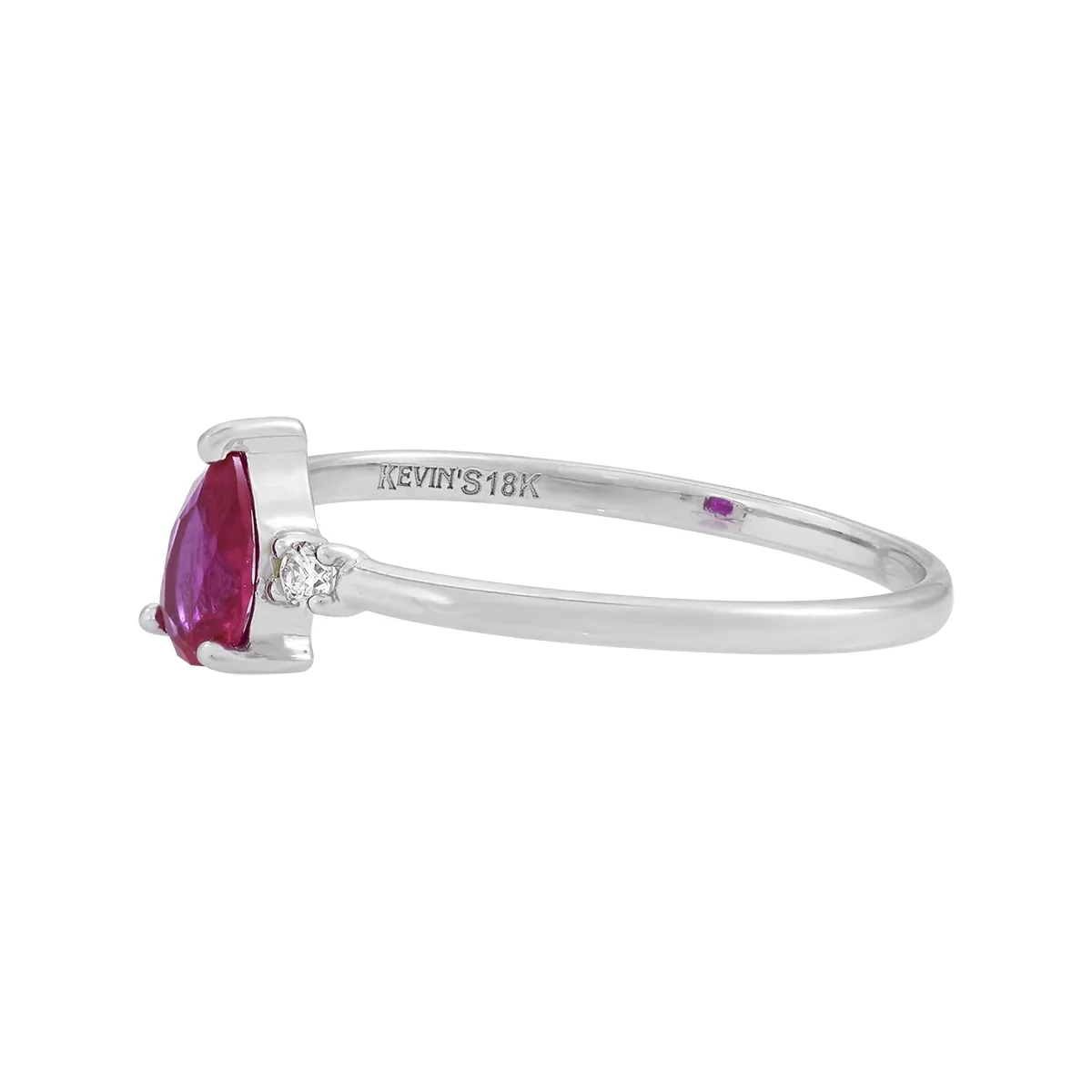 Anillo en oro blanco de 18 Kilates, con rubí sintético central de 0.45 Ct y decoración en diamantes de 0.04 Ct