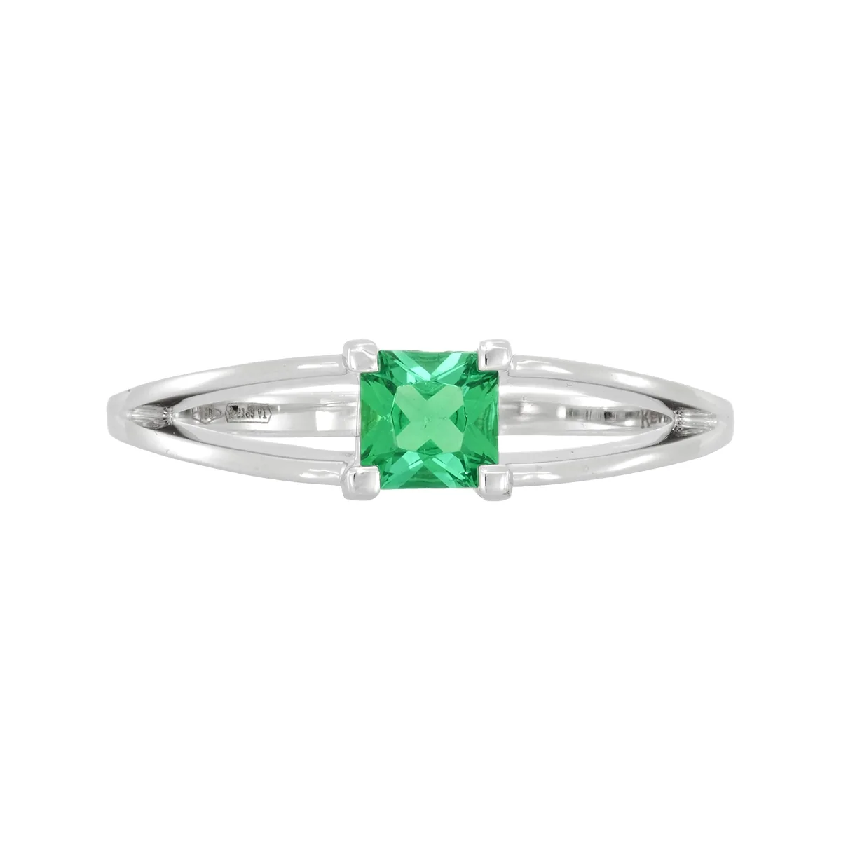Anillo en oro blanco de 18 Kilates, con esmeralda laboratorio central de 0.25 Ct