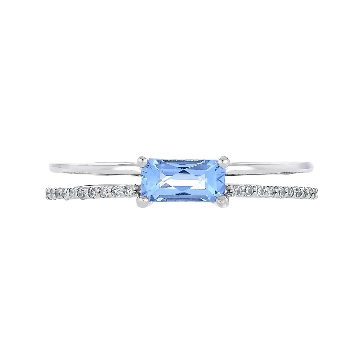 Anillo en oro blanco de 18 Kilates, con topacio central y decoración en diamantes de 0.07 Ct