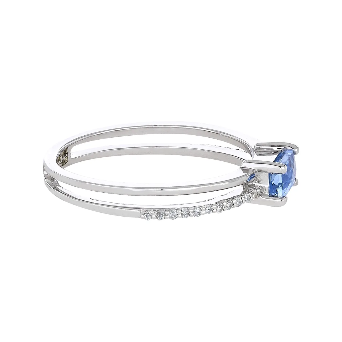Anillo en oro blanco de 18 Kilates, con topacio central y decoración en diamantes de 0.07 Ct