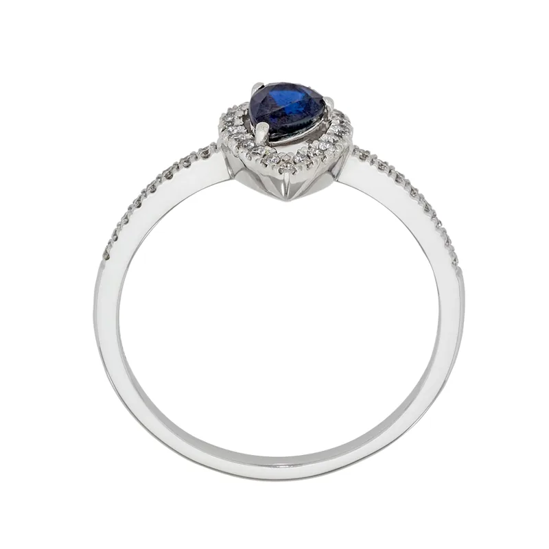 Anillo en oro blanco de 18 Kilates, con zafiro central de 0.51 Ct y decoración en diamantes de 0.17 Ct