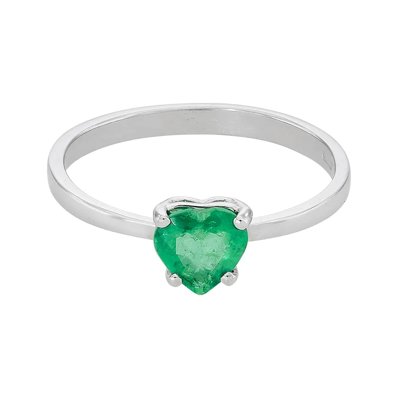Anillo en oro blanco de 18 Kilates, con esmeralda central de 0.65 Ct