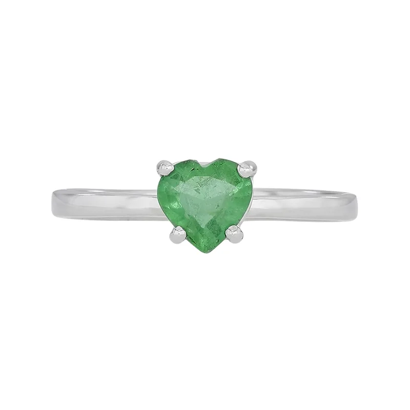Anillo en oro blanco de 18 Kilates, con esmeralda central de 0.65 Ct