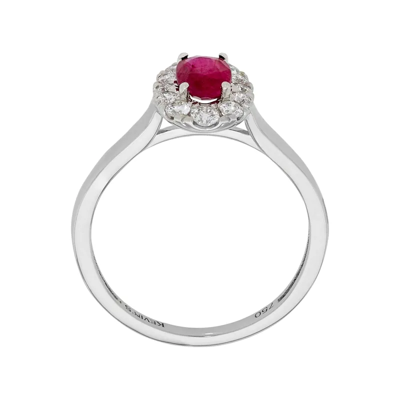 Anillo en oro blanco de 18 Kilates, con rubí central de 0.51 Ct y decoración en diamantes de 0.21 Ct