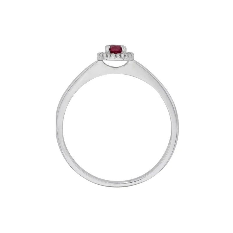 Anillo en oro blanco de 18 Kilates, con rubí central de 0.23 Ct y decoración en diamantes de 0.06 Ct