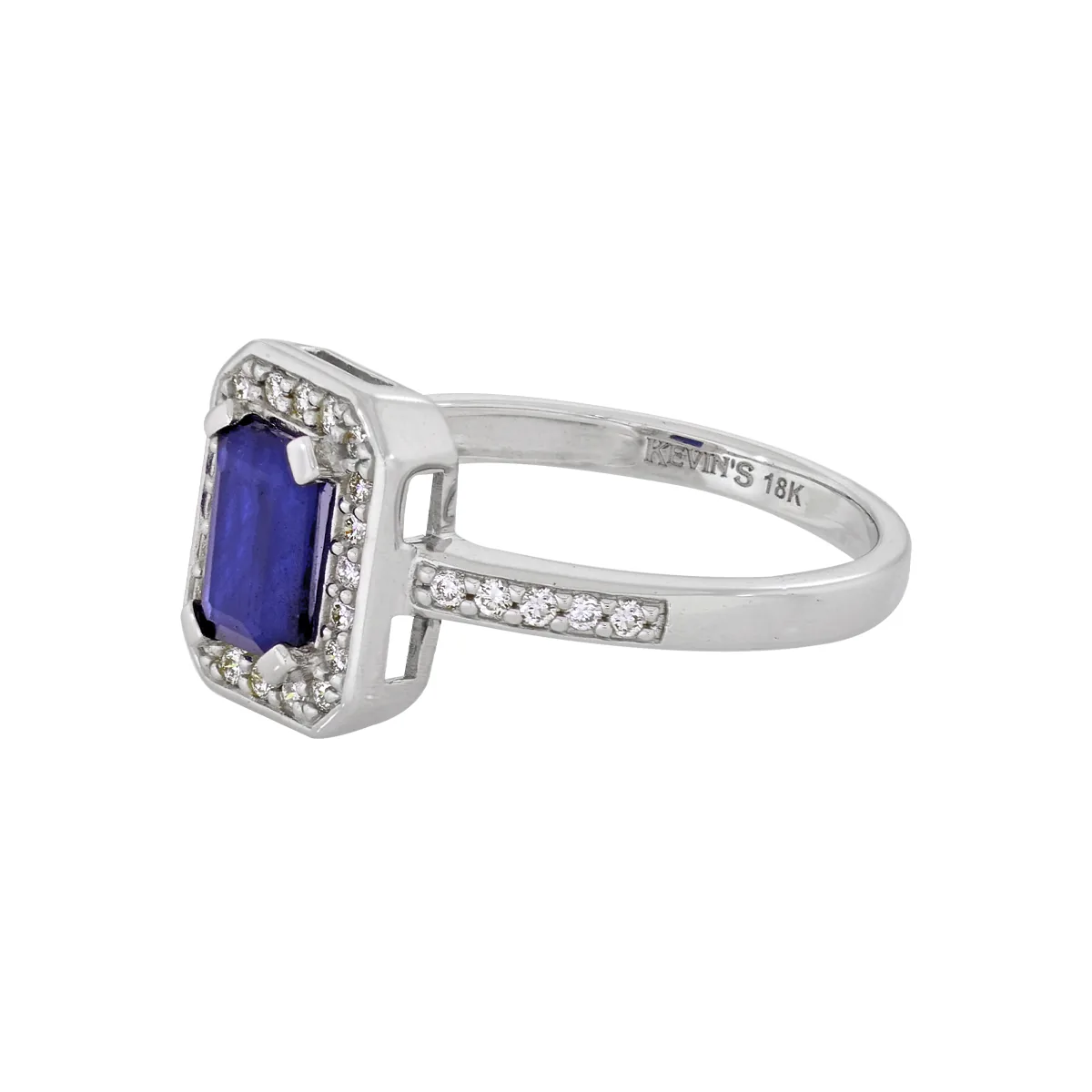 Anillo en oro blanco de 18 Kilates, con zafiro central de 0.60 Ct y decoración en diamantes de 0.15 Ct
