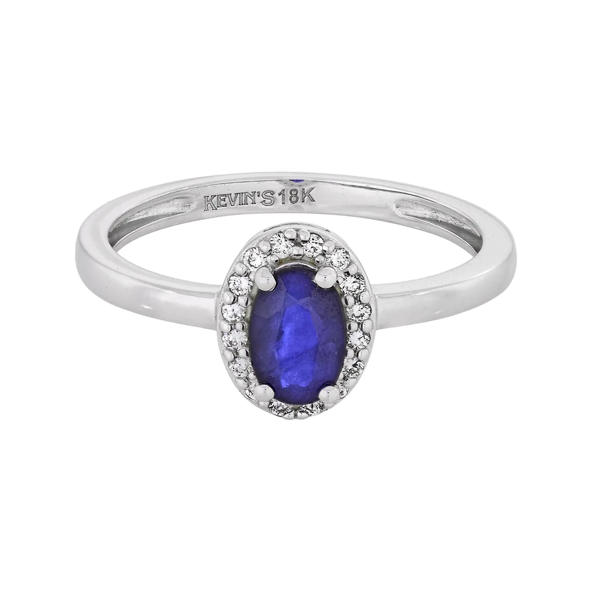 Anillo en oro blanco de 18 Kilates, con zafiro central de 0.60 Ct y decoración en diamantes de 0.08 Ct
