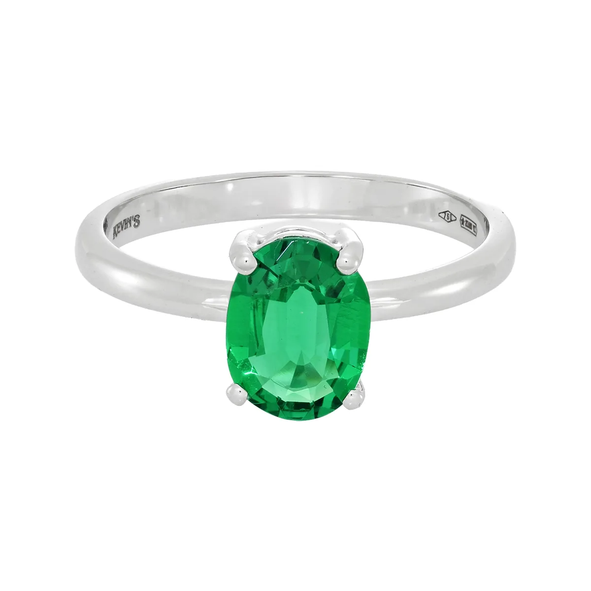 Anillo en oro blanco de 18 Kilates, con esmeralda laboratorio central de 0.85 Ct