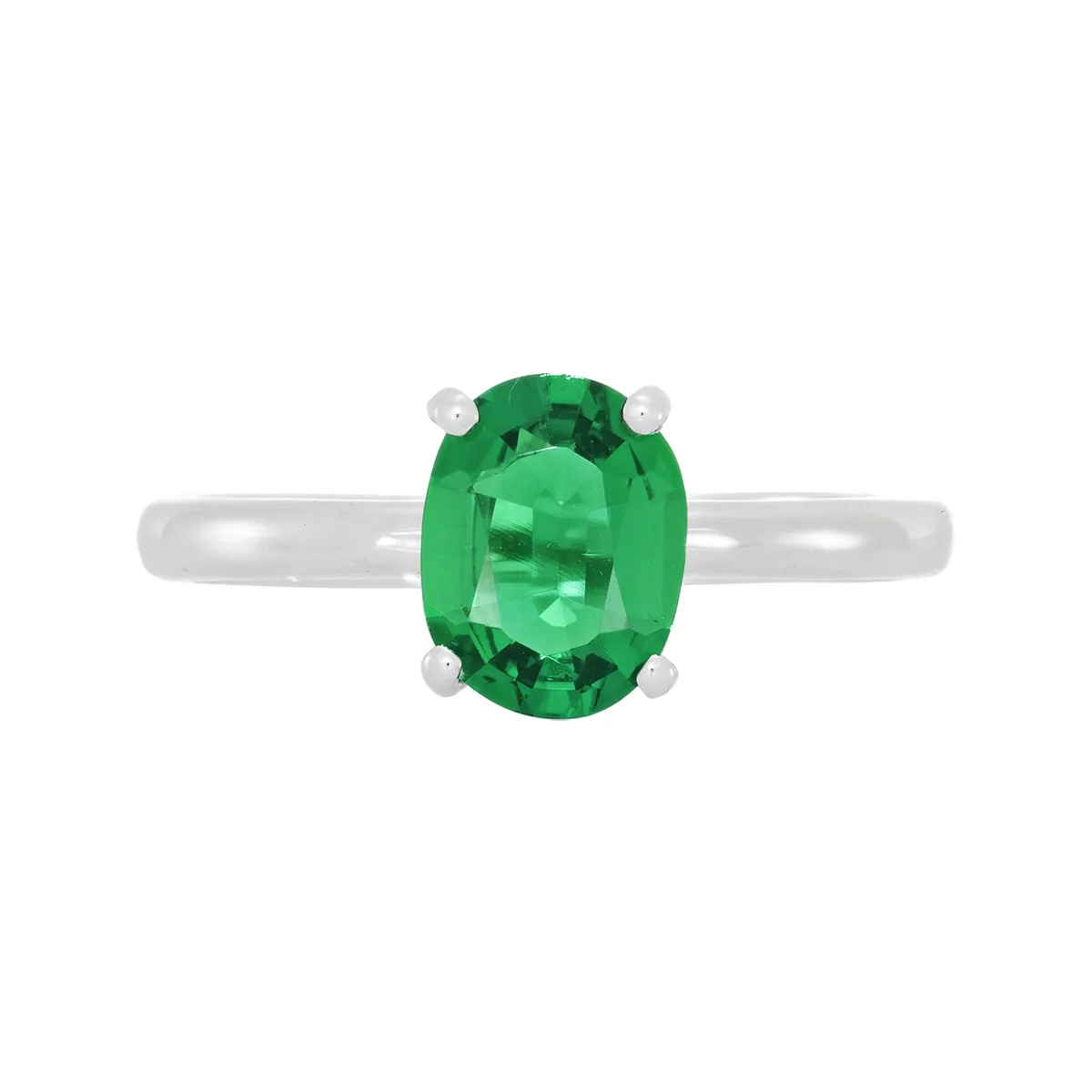 Anillo en oro blanco de 18 Kilates, con esmeralda laboratorio central de 0.85 Ct
