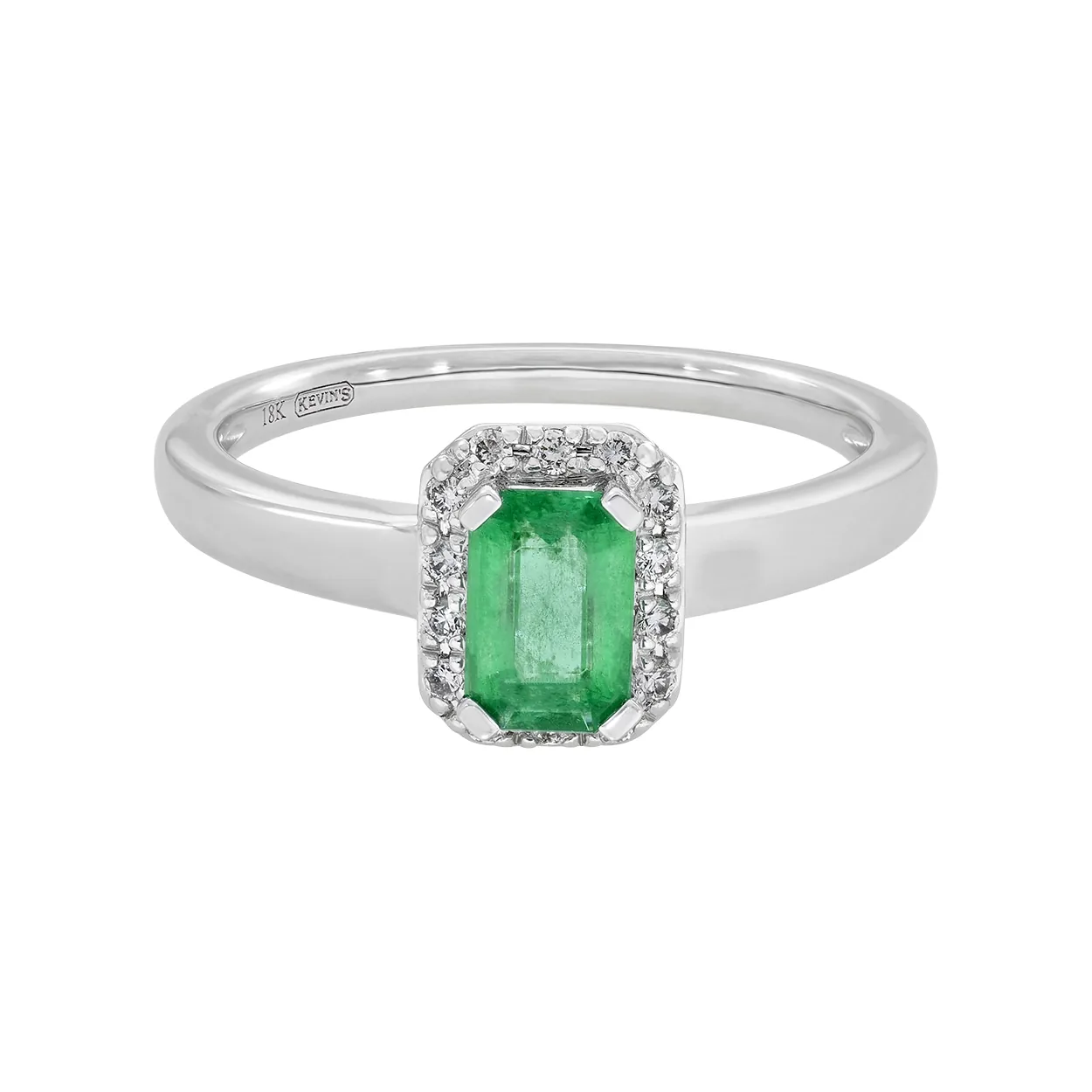 Anillo en oro blanco de 18 Kilates, con esmeralda central de 0.60 Ct y decoración en diamantes de 0.08 Ct