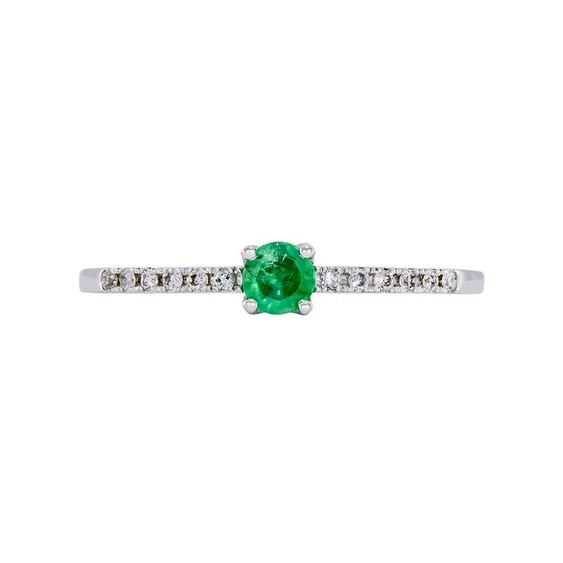 Anillo en oro blanco de 18 Kilates, con esmeralda central de 0.15 Ct y decoración en diamantes de 0.06 Ct
