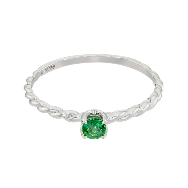 Anillo en oro blanco de 18 Kilates, con esmeralda central de 0.15 Ct