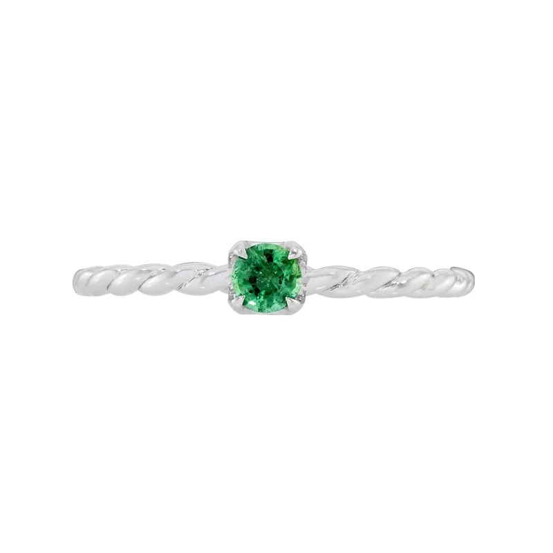 Anillo en oro blanco de 18 Kilates, con esmeralda central de 0.15 Ct