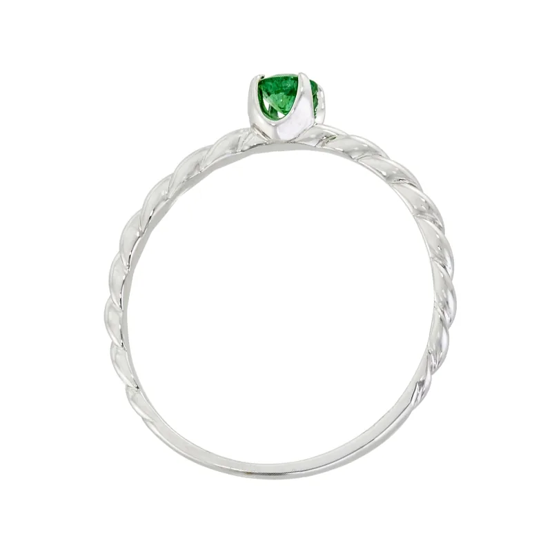 Anillo en oro blanco de 18 Kilates, con esmeralda central de 0.15 Ct