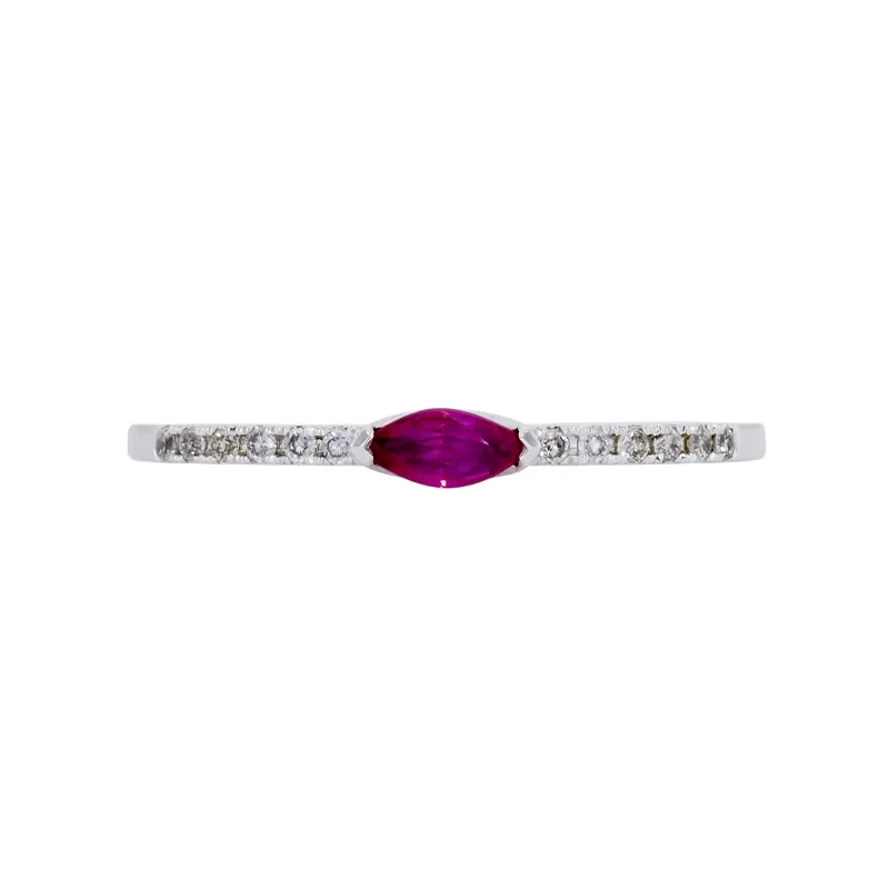 Anillo en oro blanco de 18 Kilates, con rubí central de 0.15 Ct y decoración en diamantes de 0.06 Ct