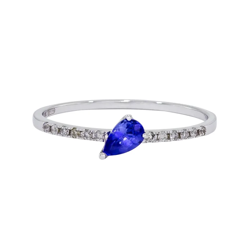 Anillo en oro blanco de 18 Kilates, con zafiro central de 0.25 Ct y decoración en diamantes de 0.06 Ct