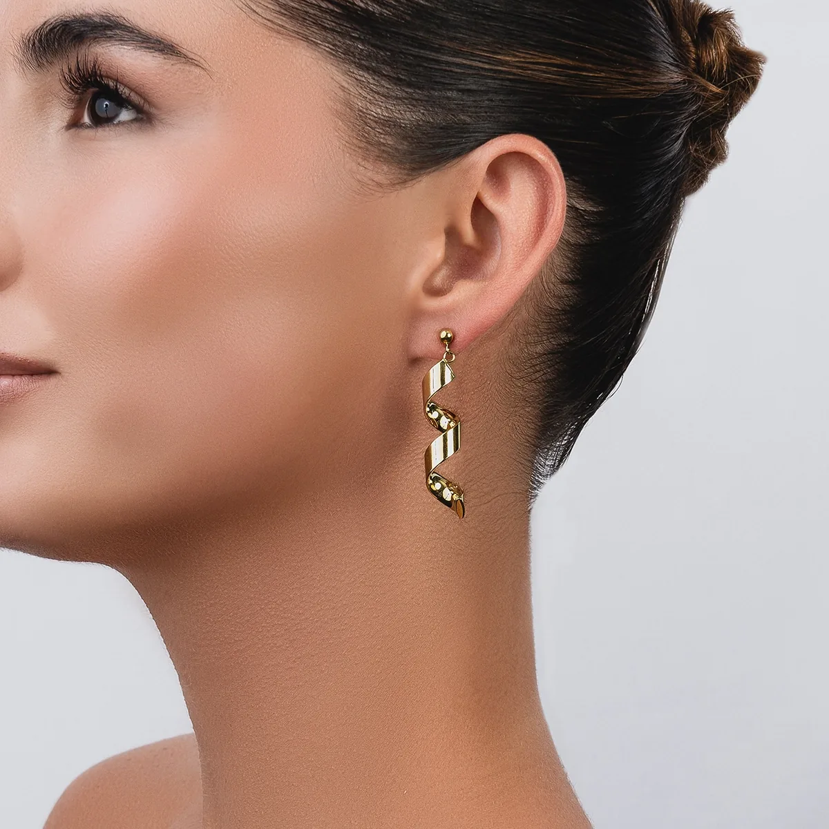 Aretes en oro amarillo de 18 Kilates, Espiral