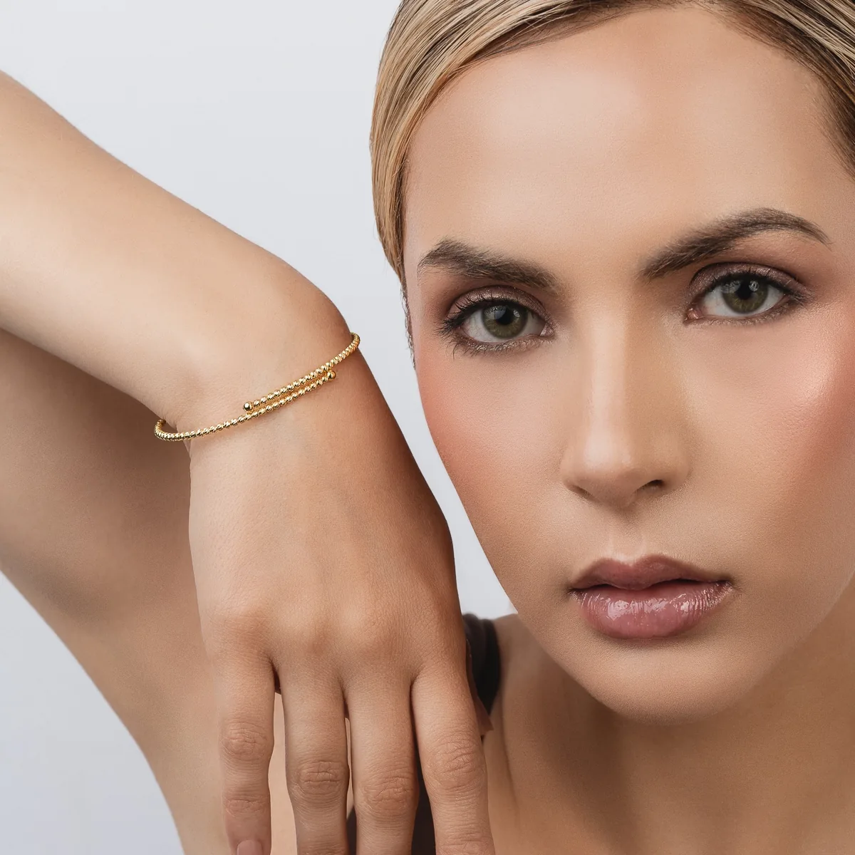 Aro en oro amarillo de 18 Kilates con visos, Pallinato, 2 mm. de ancho