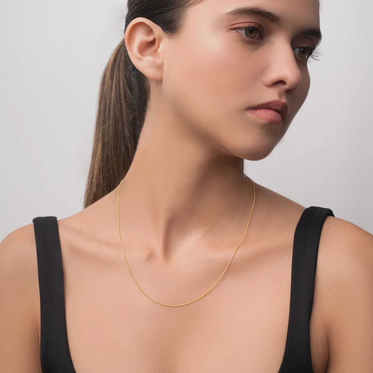 Cadena en oro amarillo de 18 Kilates, Espiga, 50 cm. de largo, 0.70 mm. de ancho