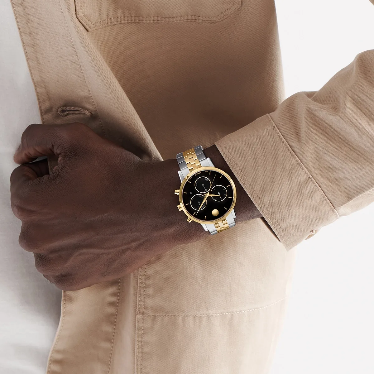 Reloj Movado análogo, para Hombre, tablero redondo colores negro y dorado, estilo index, pulso acero colores plateado y dorado, calendario, cronografo