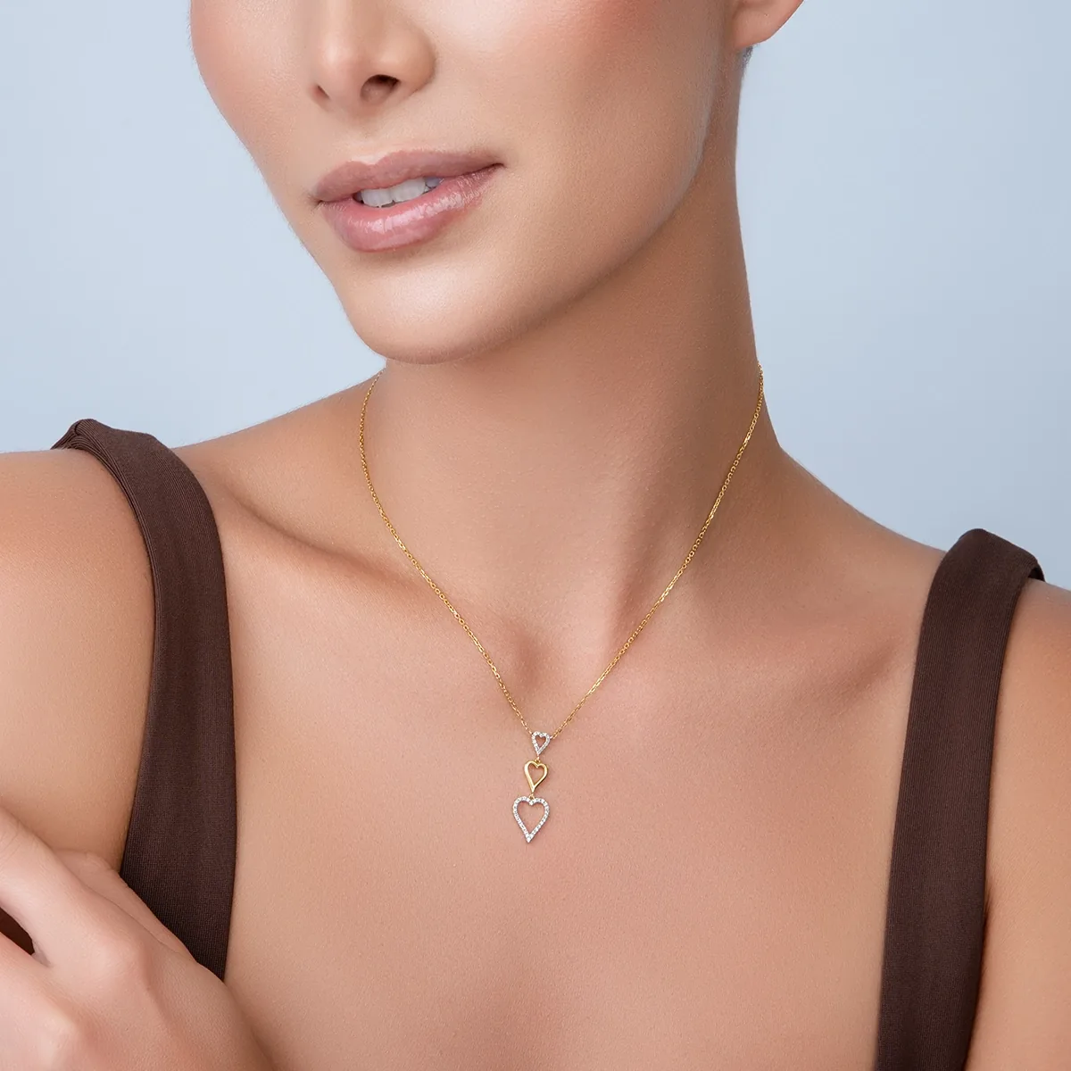 Gargantilla en oro amarillo de 18 Kilates, Corazón, con diamantes de 0.14 Ct, 40 cm. de largo, 1 mm. de ancho